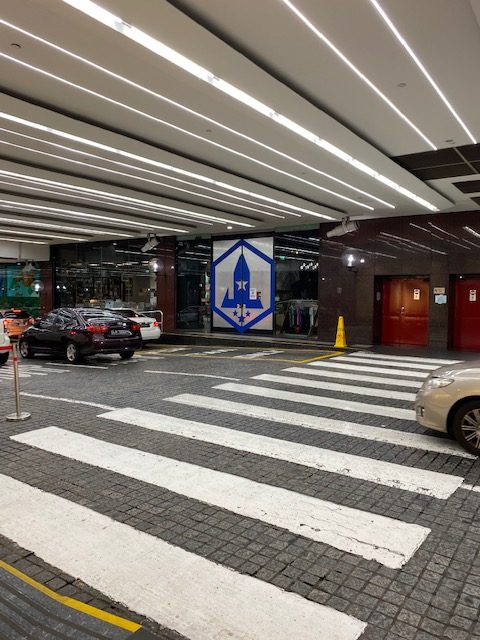 Entrace to DC Super Heroes Cafe at Takashimaya. The blue and grey door is the entrance.